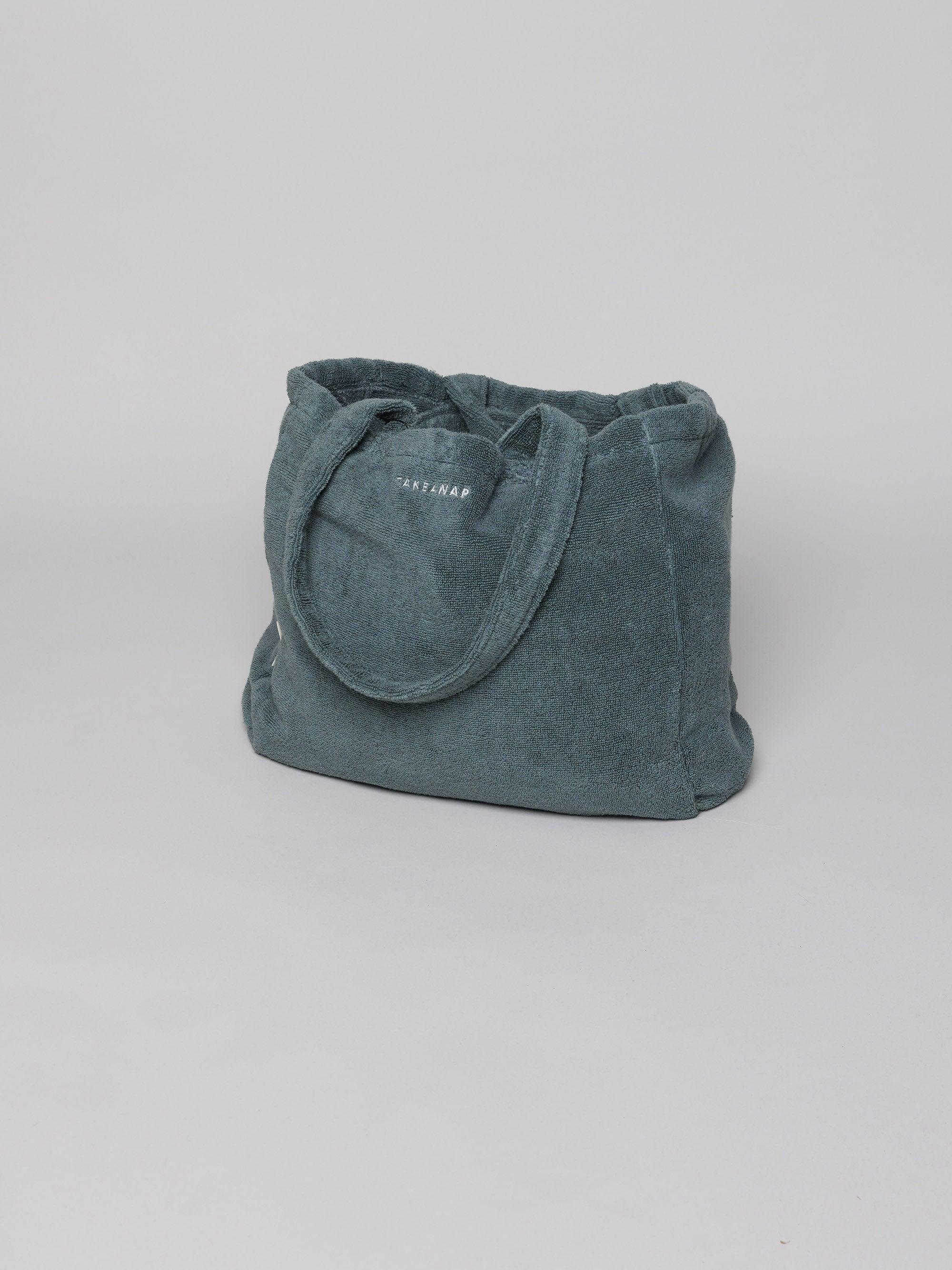 תיק לים Quality בצבע אוושן על רקע אפור בהיר בוהק