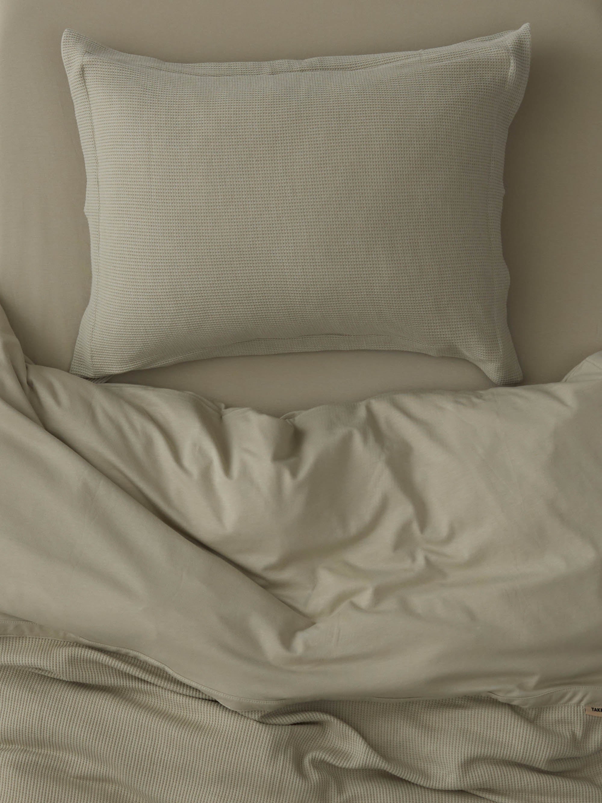 ציפית לכרית תינוק טריקו Jacquard - פיסטוק